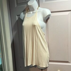 Off white backless top.